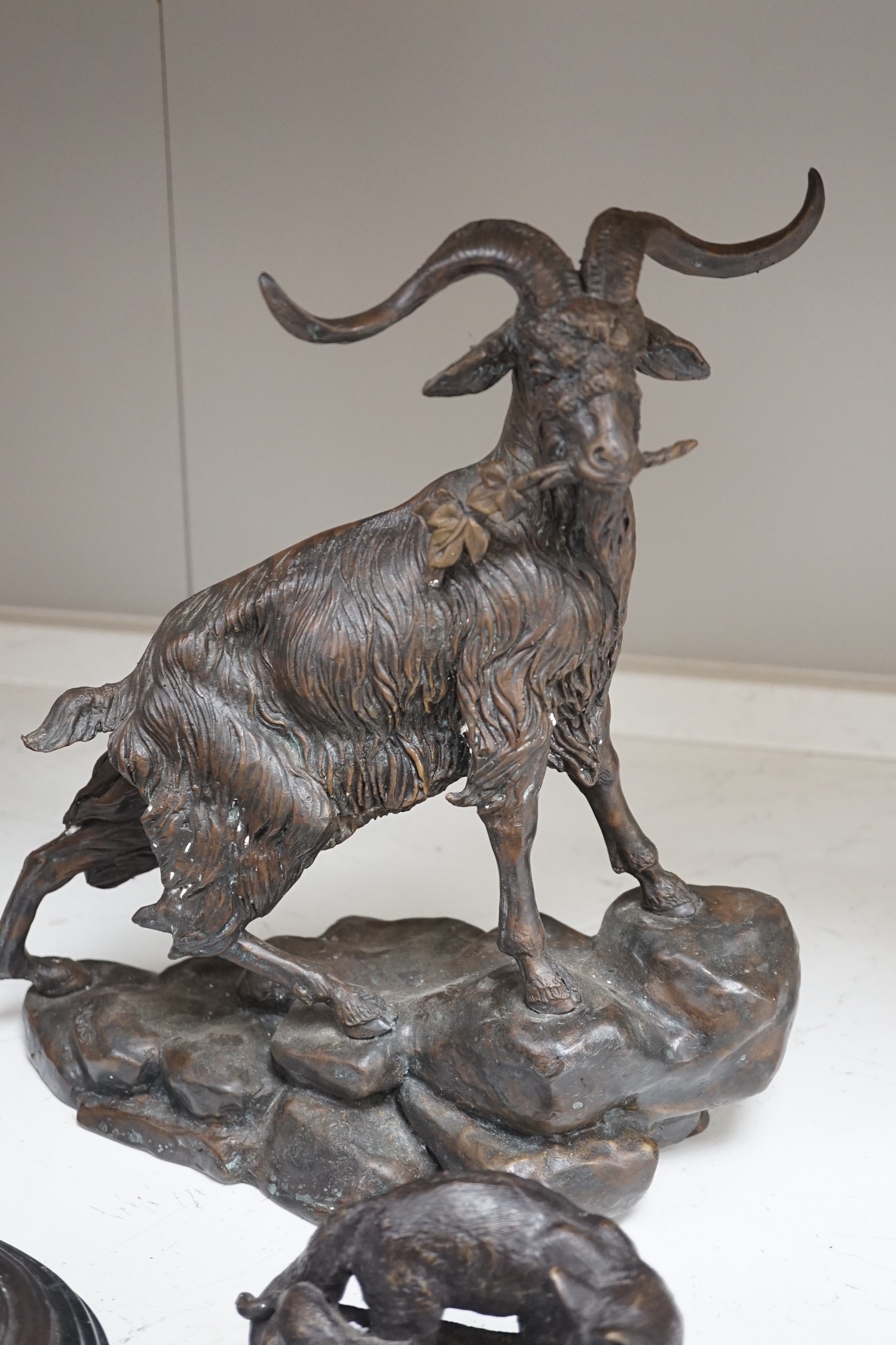 Four bronze animal groups, three foxes, a ram, a stag and two dogs, tallest stag 40.5 cms high